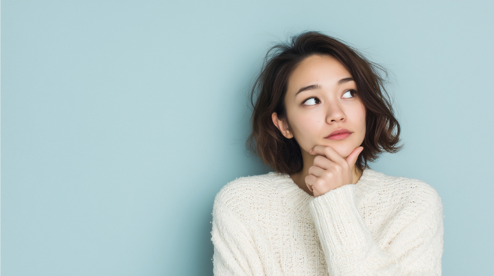 保険と自費のクリーニングは何が違うのか考える女性