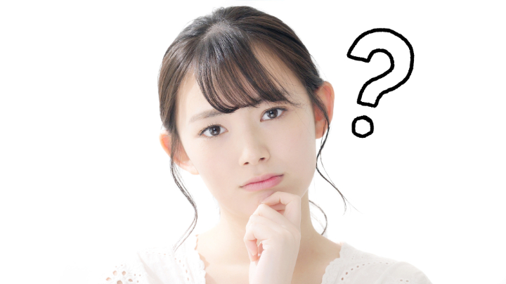 虫歯の治療に保険は適用されるのか考える女性